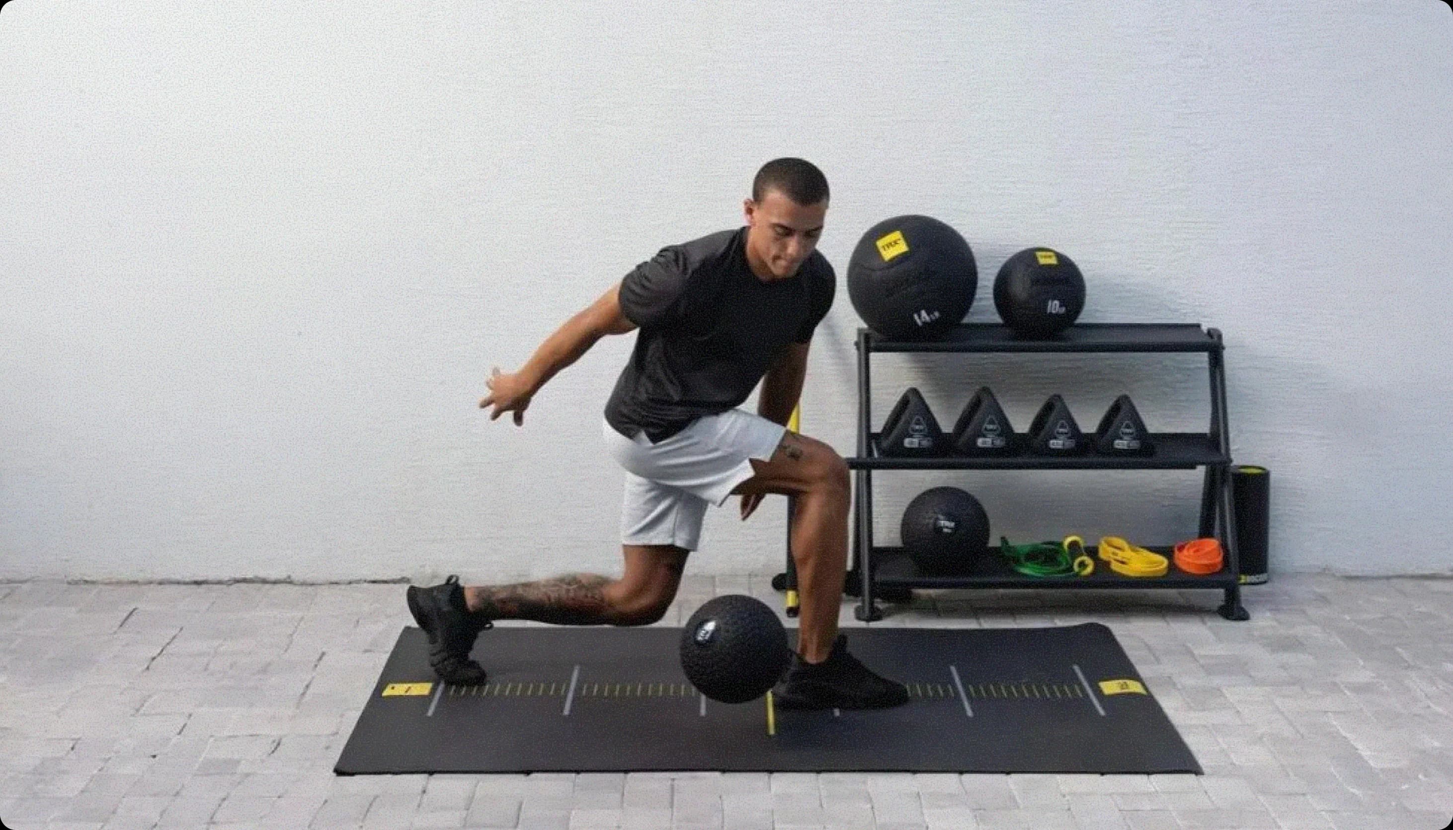 Athlete training with TRX fitness equipment